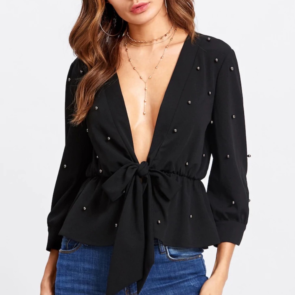 NWOT Knotted front beaded peplum plunge blouse